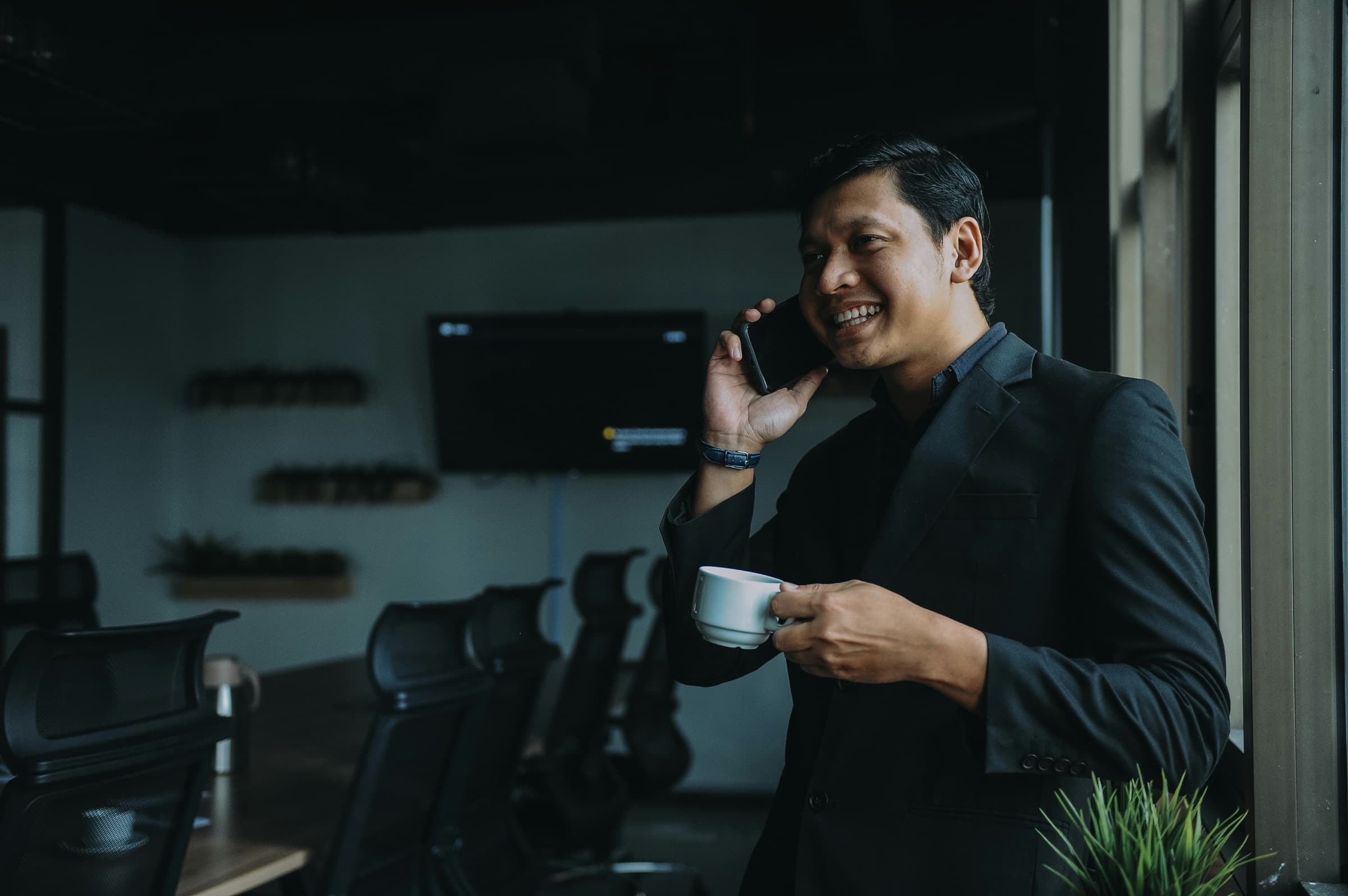 A station owner on a call, staying on top of the business